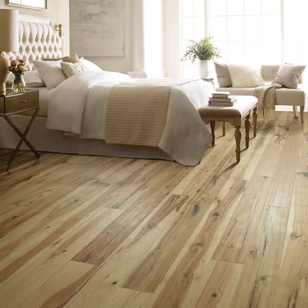 Natural wood hardwood floor in bedroom