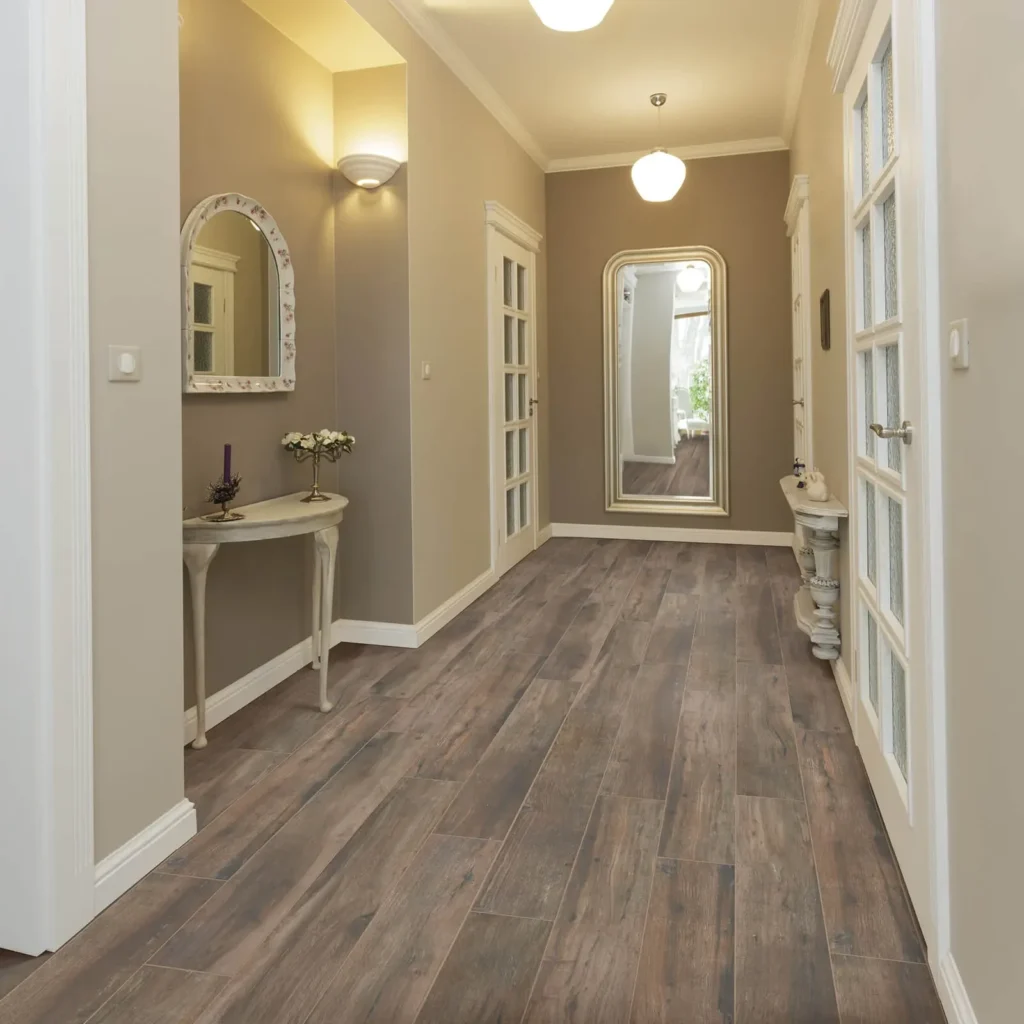 Warm wood-look tile flooring in hallway