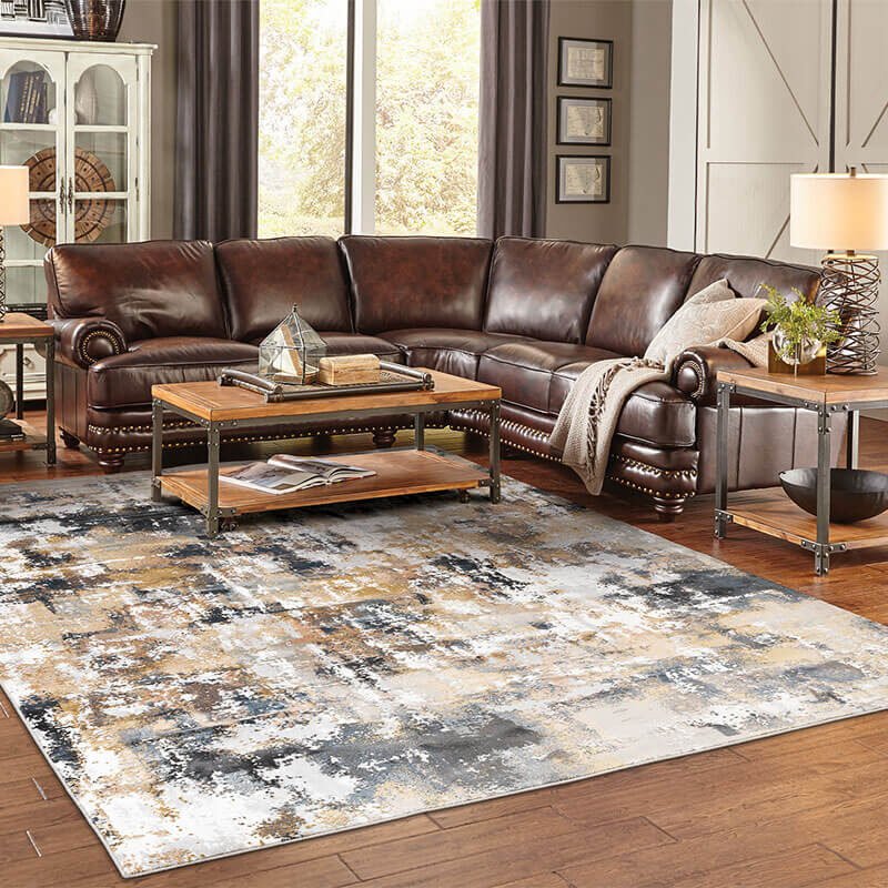 Modern abstract rug in brown and beige living room